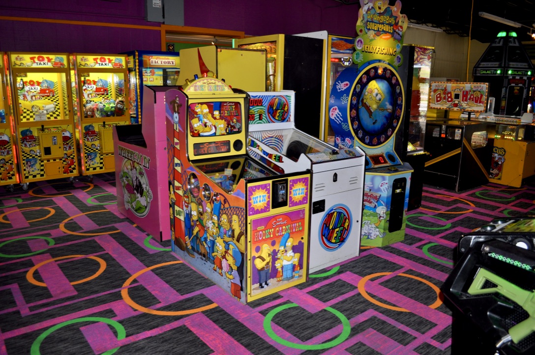 Calypsos Cove Arcade, the image shows arcade games such as Sponge Bob and the Simpson