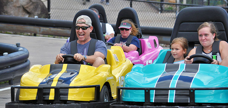 Guests enjoying a Go-Kart ride on the track at Calypso's. 