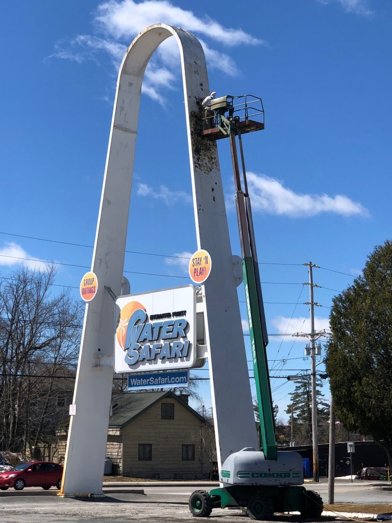 Repainting the arch at Water Safari