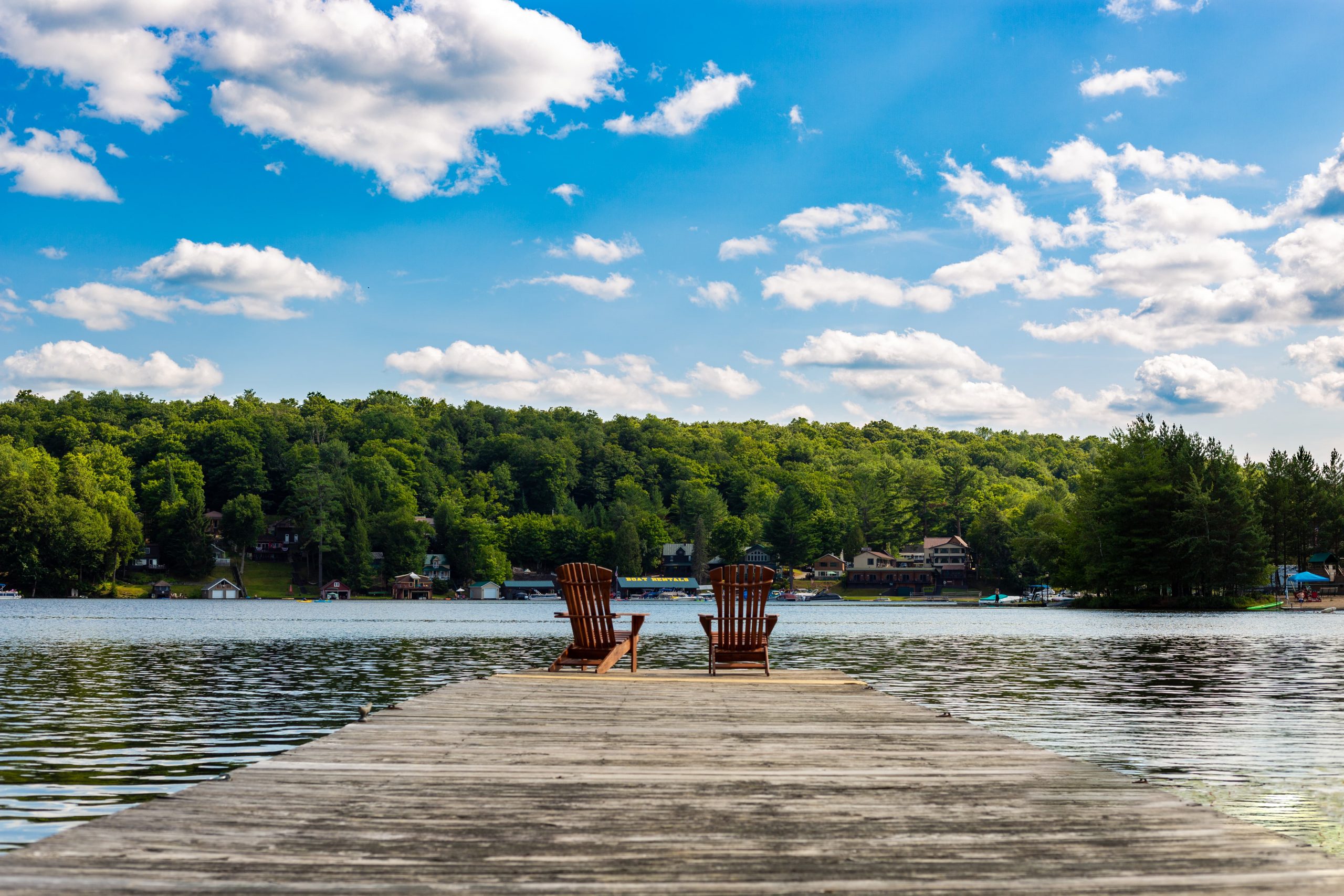 Adirondack chairs on the lake
